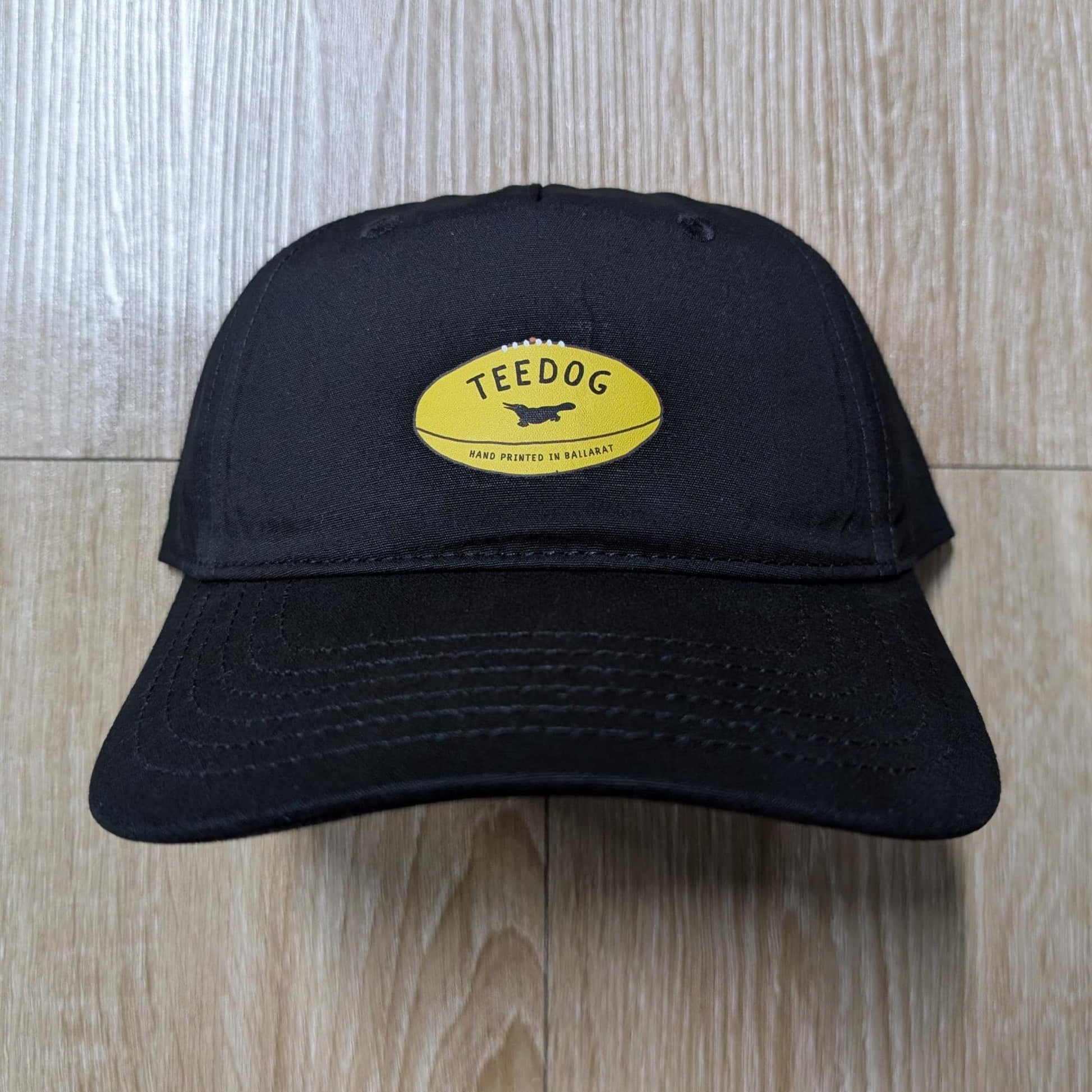 Aussie Rules Footy Hat – Yellow Football Logo Dad Cap – Hand Printed Black Headwear – Fan Gear for Men & Women – Aussie Rules Gift
